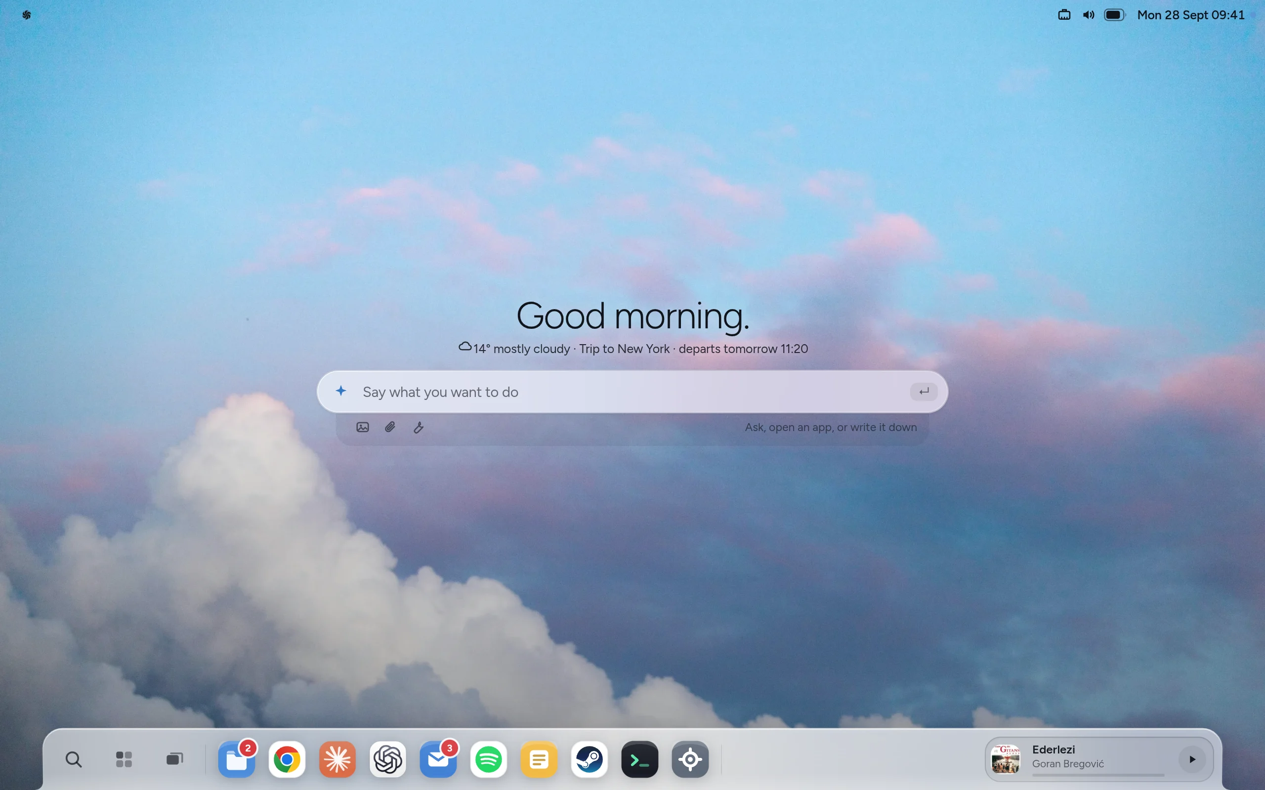 The Avio desktop: “Good morning.”, the weather and the trip tomorrow, and a field that says “Say what you want to do”